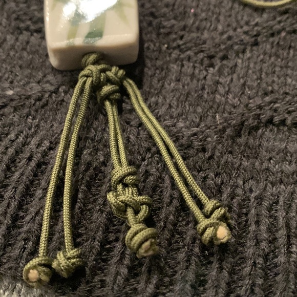 Asian Style Green Faux Leather Cord Necklace with Ceramic Pendant & Knot Details - Picture 4 of 4